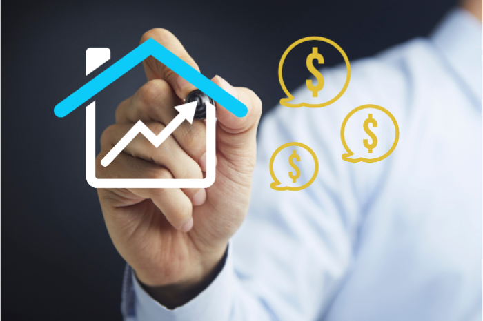 a hand with writing utensil at figures of a fluctuating and upwards arrow within u-shaped line and underneath upside-down v-shaped line and three USD symbols inside variously sized chat bubbles